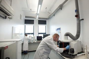 Scientists in analytical radiochemistry laboratory